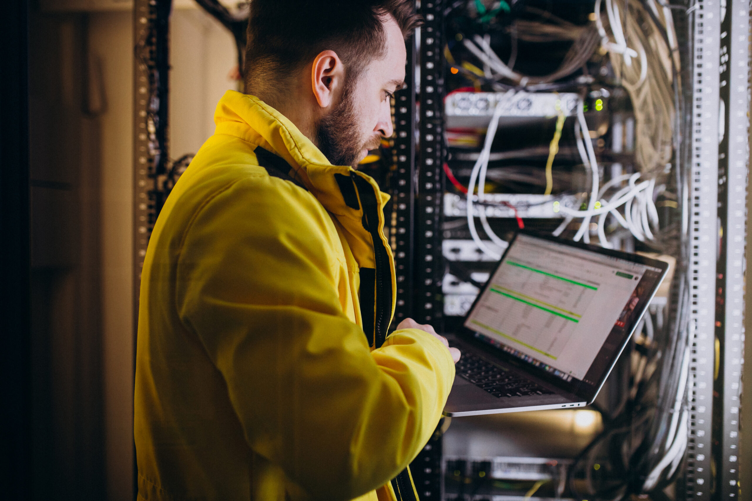 Young man engineer Voice Data Video System Installer